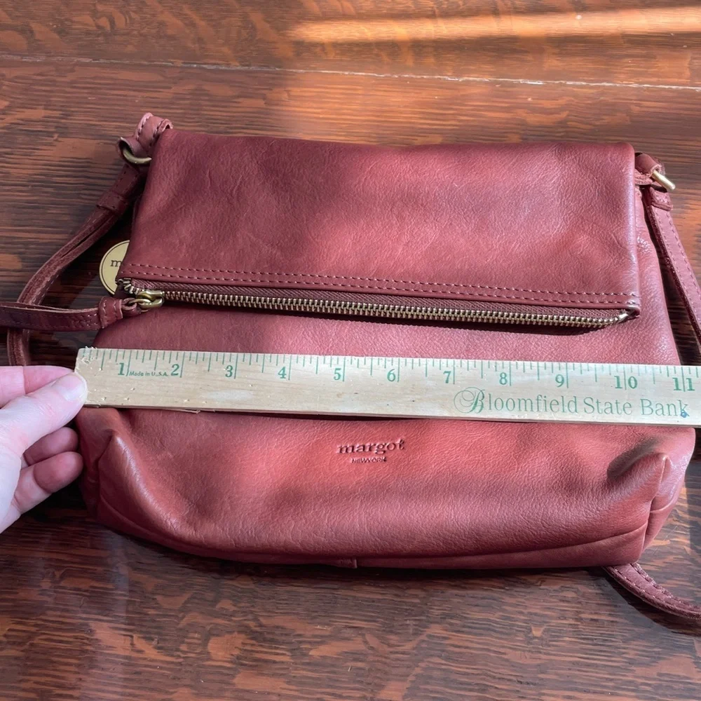 Margot Rob fold over Crossbody clutch